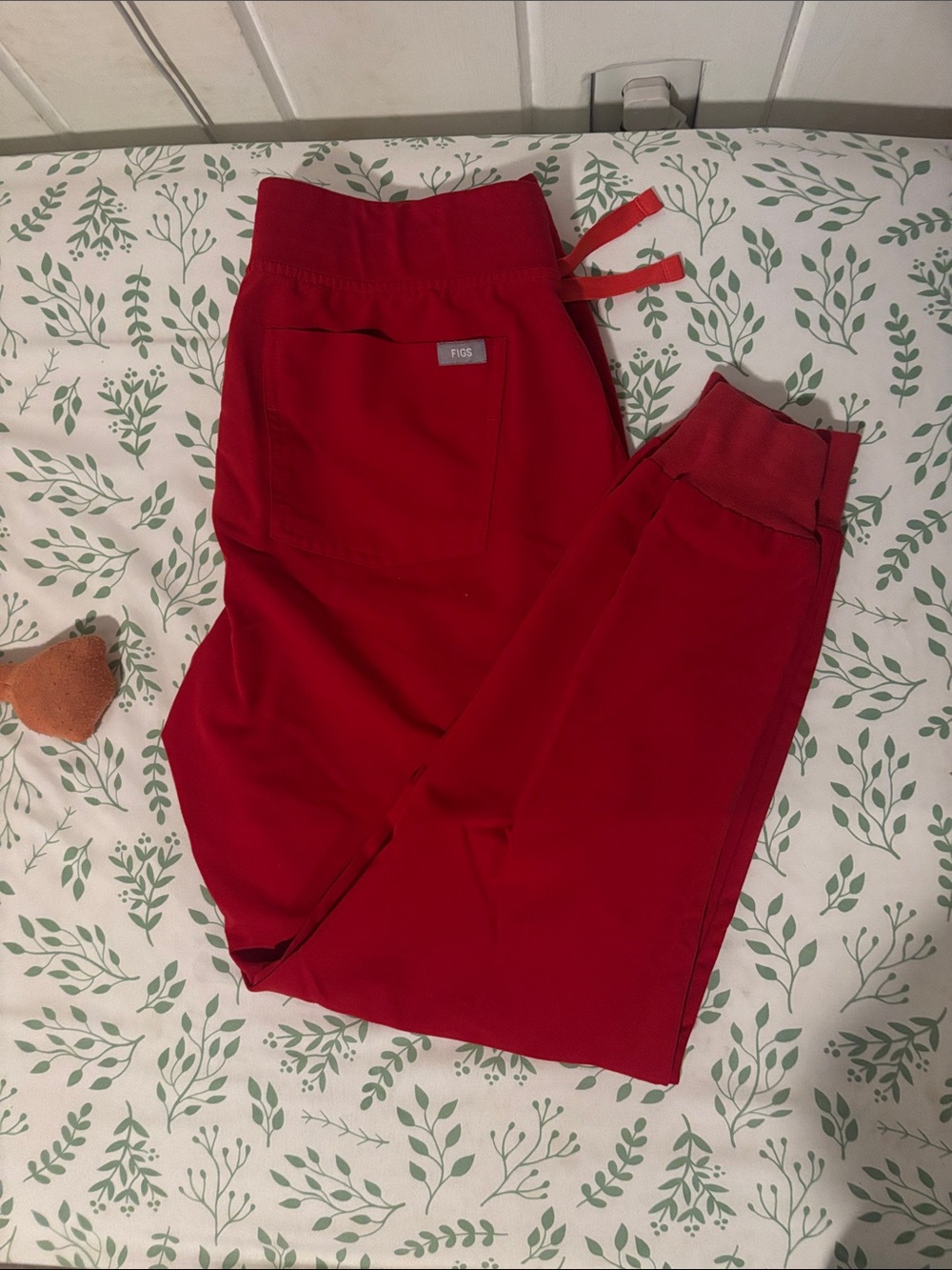 FIGS winning red joggers